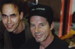 John (wearing a “J.D. Cooks” sports cap) and Paul (hatless) share a smile.